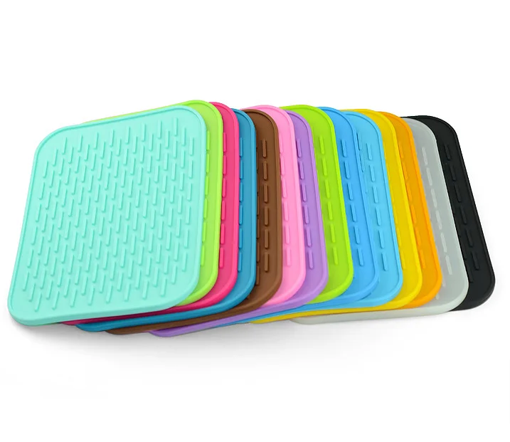 Silicone 4-in-1 Kitchen Tool: Pot Holder, Trivet, Jar Opener, and Spoon Rest